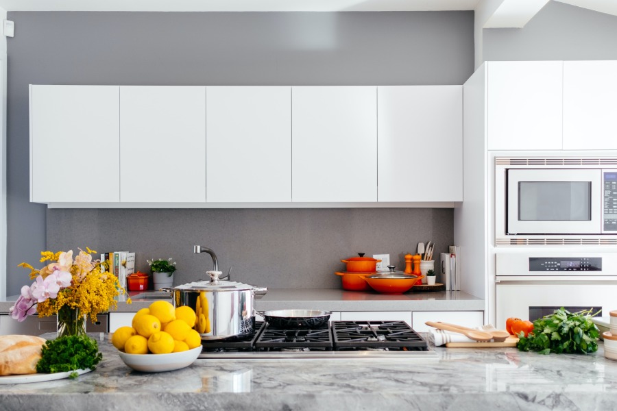 Beautiful Miami Kitchen Countertop Installation: A Stunning Modern Kitchen with White Cabinets and Grey Granite Countertops